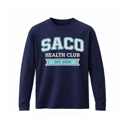 The HERITAGE Long Sleeve Tee by Southern Apparel is a navy blue sweatshirt made from premium fabric, featuring "SACO HEALTH CLUB EST. 2024" in bold light blue and white on the front. Ideal for comfortable everyday teamwear.