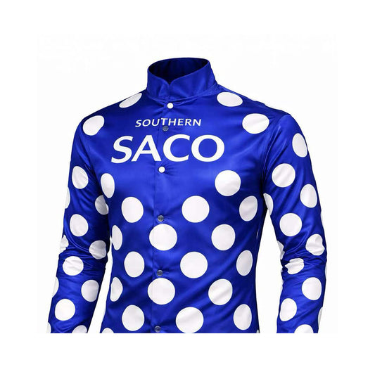 The Southern THOROUGHBRED Jacket ELITE Silk by Southern Apparel is a blue, long-sleeved button-up with large white polka dots, SOUTHERN SACO on the chest, and a high collar—designed for race-day visibility in classic Elite Silks style.